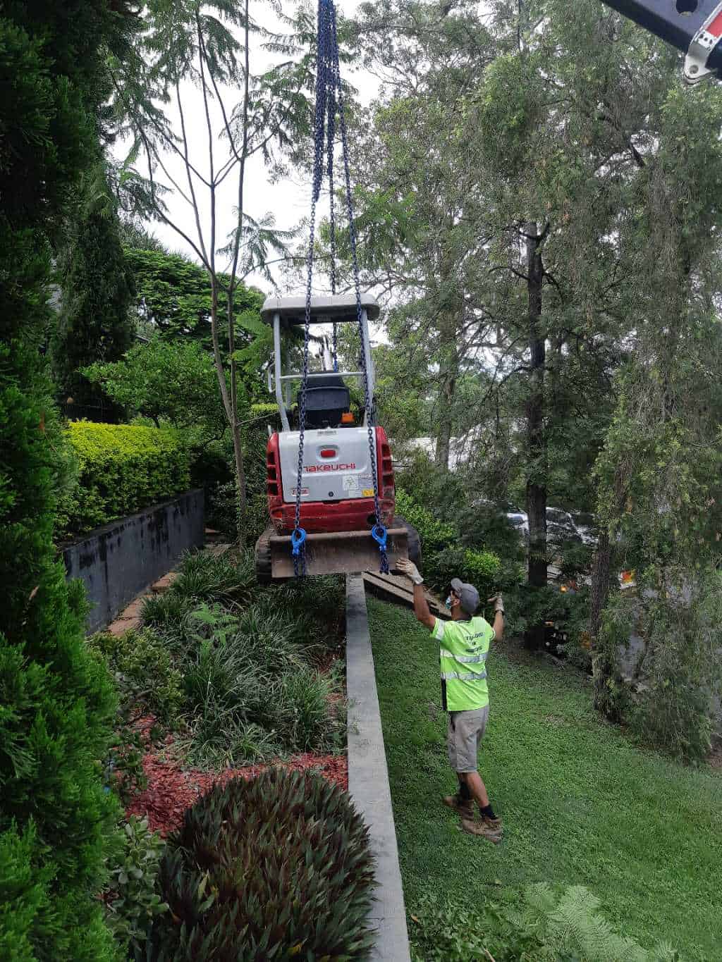 Moving excavator with crane