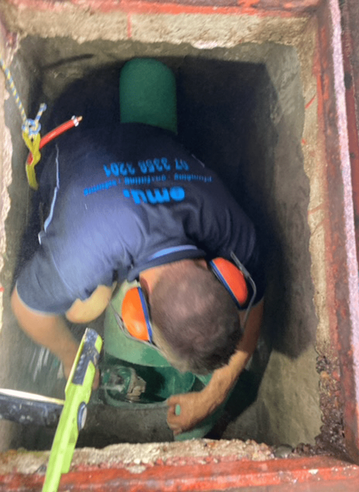 Emu plumber working on pipe relining in Brisbane