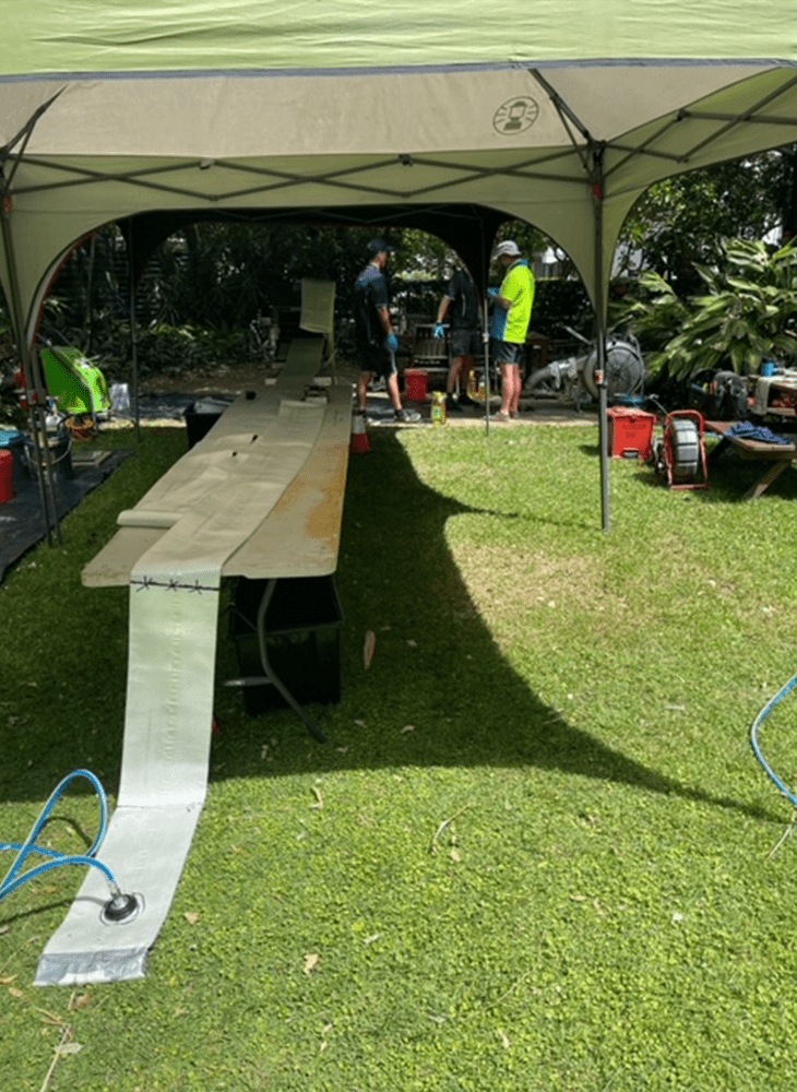 pipe liner being prepped to reline an underground pipe