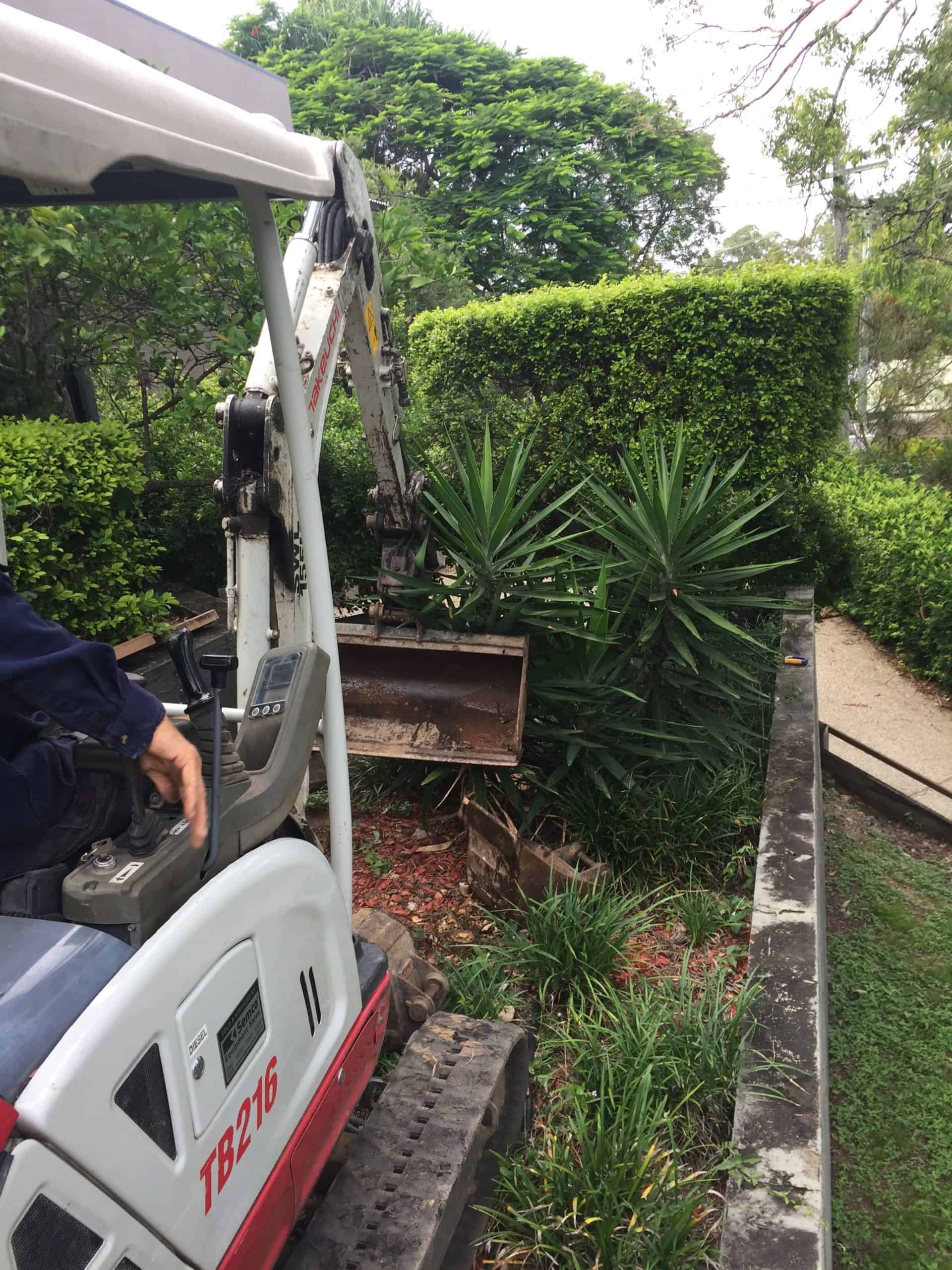 Using excavator to repair hard to reach pipe